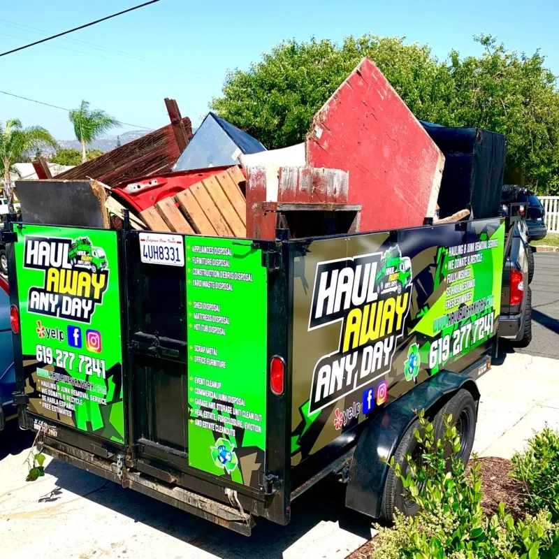 Trailer loaded with furniture and household junk