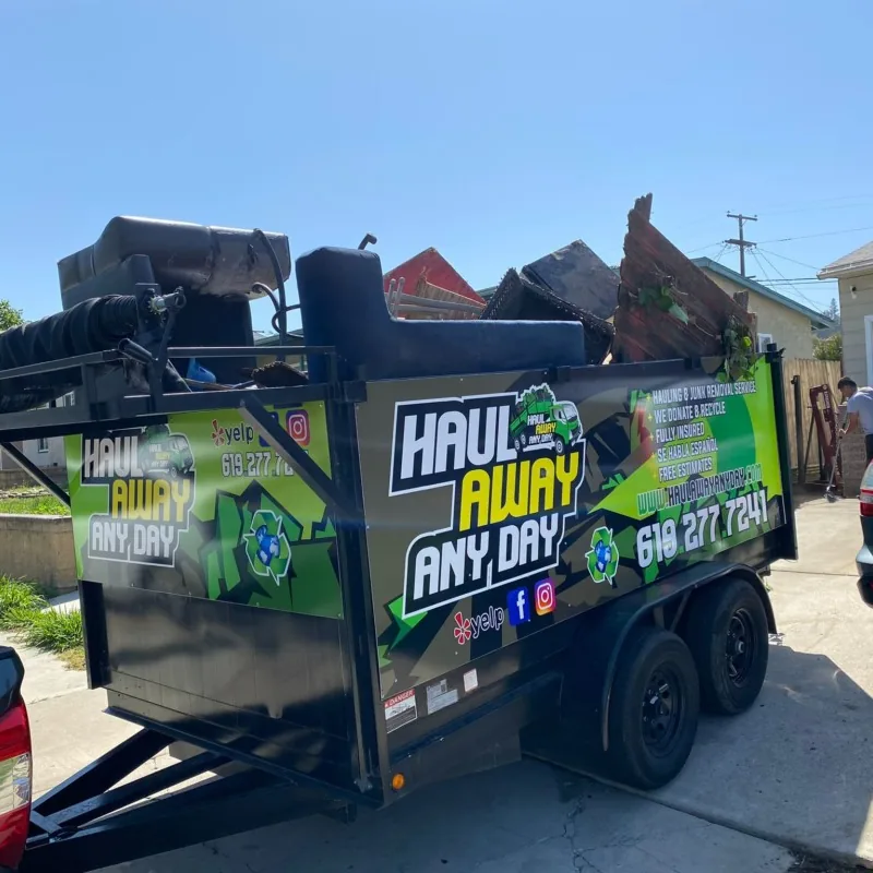 Haul Away Any Day trailer on a residential job