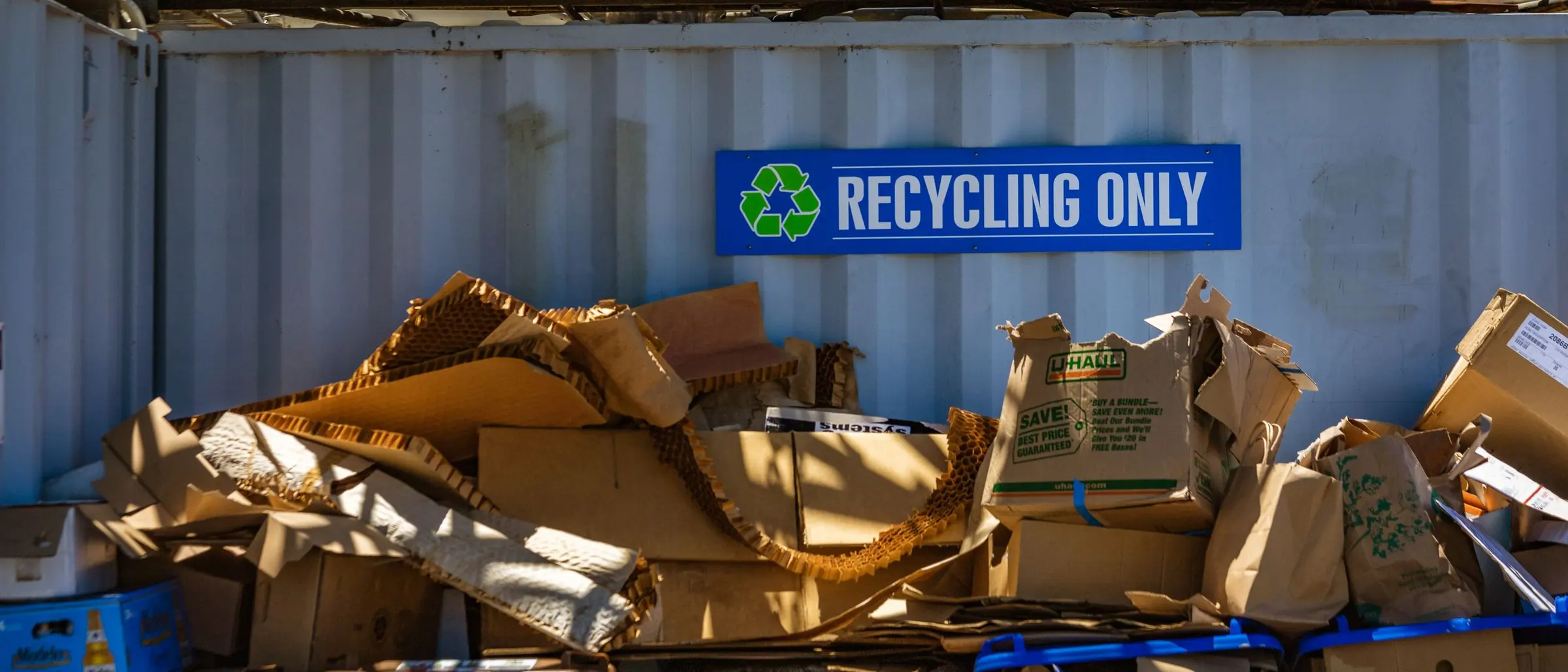 Cardboard sorted for recycling inside a recycling facility