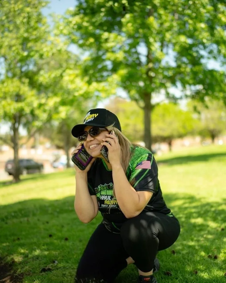 Haul Away Any Day team member answering customer calls